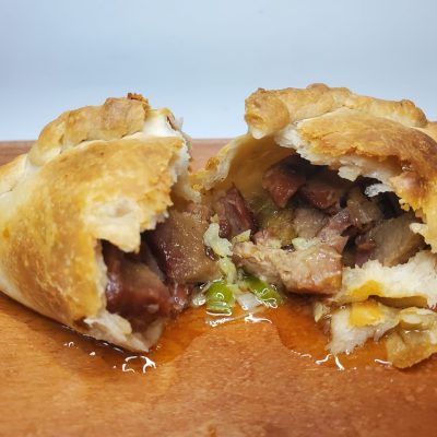 PORK SISIG : Popular Filipino dish. It is composed of minced pork, chopped onion, and flavourful spices.